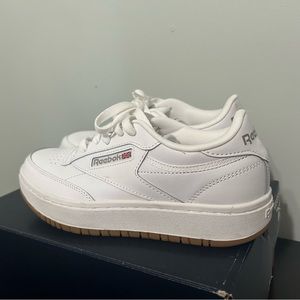 Reebok white tennis shoes with high sole